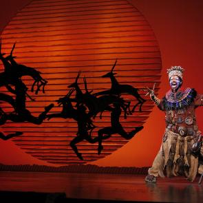 Buyi Zama as “Rafiki” in THE LION KING North American Tour. ©Disney. Photo by Joan Marcus