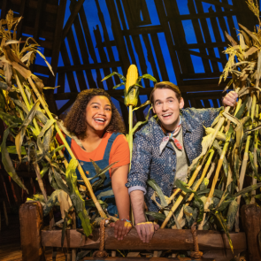 PHOTO CREDIT: Maya Lagerstam (Storyteller 1) and Tyler Joseph Ellis (Storyteller 2) in The North American Tour of SHUCKED. Photo by Matthew Murphy and Evan Zimmerman