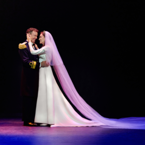 Kevin Earley (Captain Georg von Trapp) and Cayleigh Capaldi (Maria Rainer) in The Sound of Music. Photo by Jeremy Daniel. 